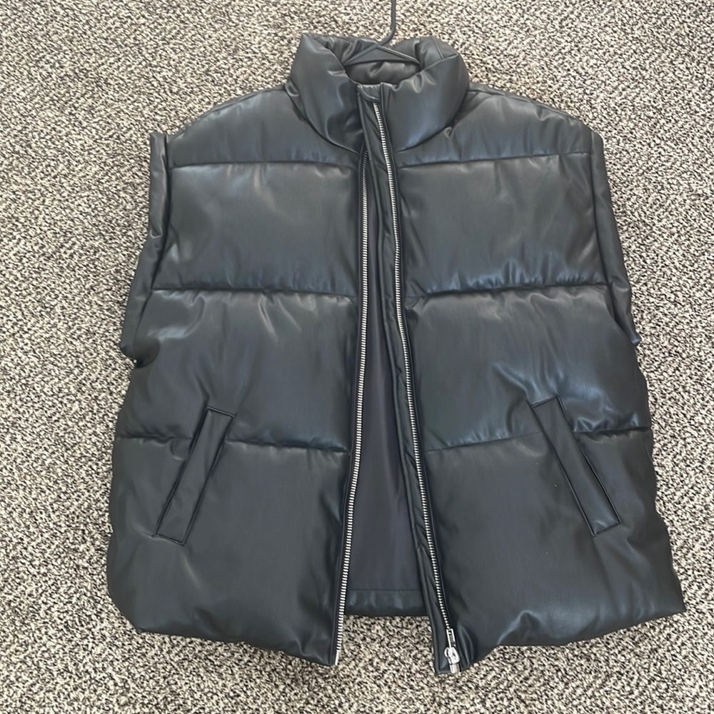 Forever 21 faux leather vest. Oversized fit. NEW WITH TAGS. GREAT QUALITY.